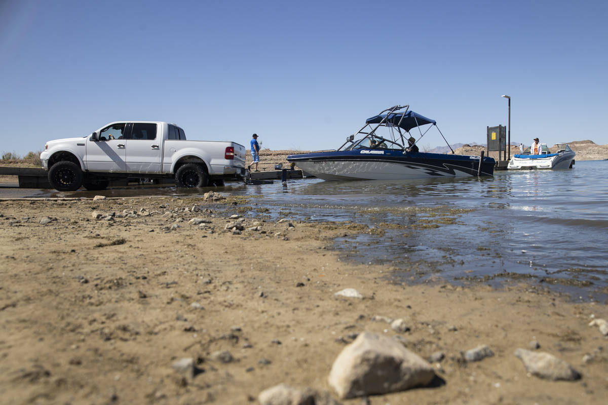 A boat is moved to the water at Hemenway Harbor in Boulder City on Wednesday, May 5, 2021. (Eri ...