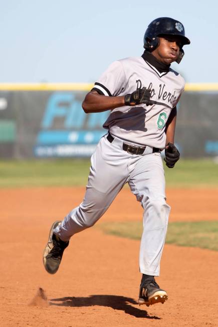 Palo Verde's left fielder Corey Stratton (6) rounds the bases to third during a high school bas ...