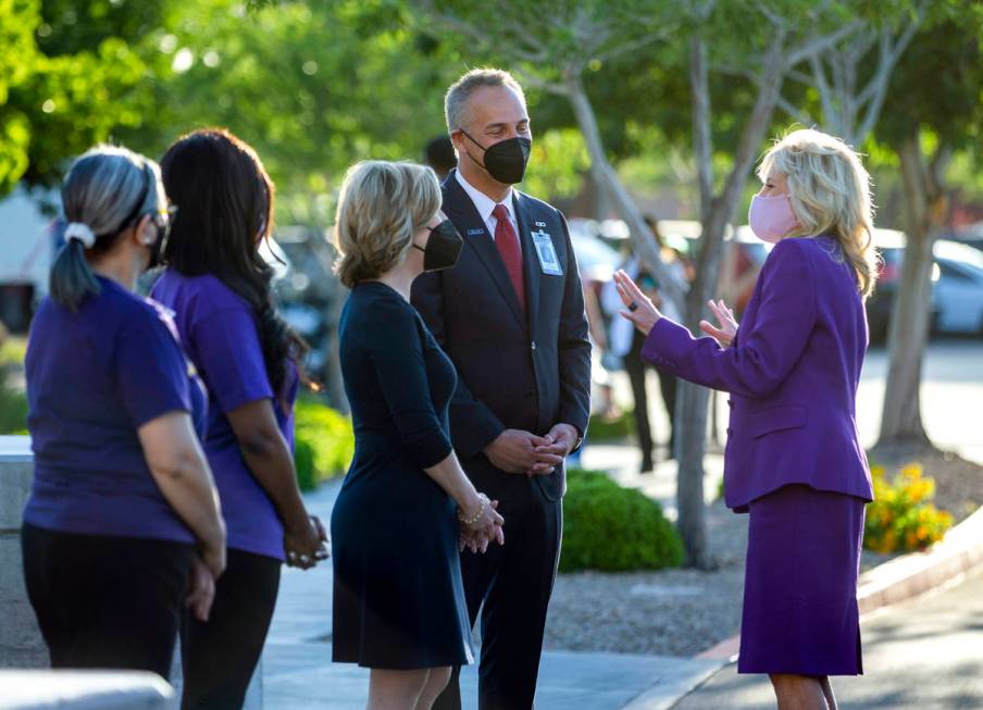 First Lady Jill Biden, from right, is greeted by University Medical Center CEO Mason Van Houwel ...