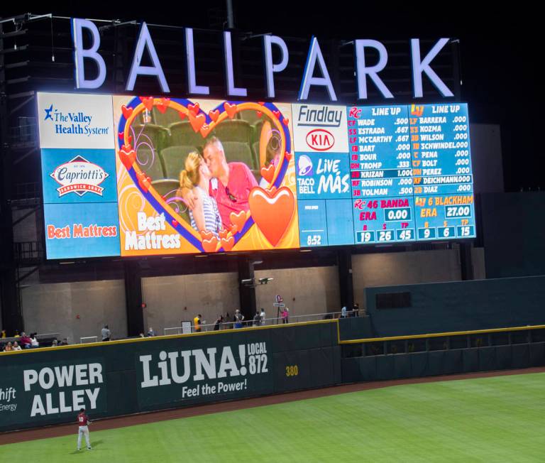 Fans kiss on the kiss cam during a Triple-A baseball game between the Las Vegas Aviators and Sa ...