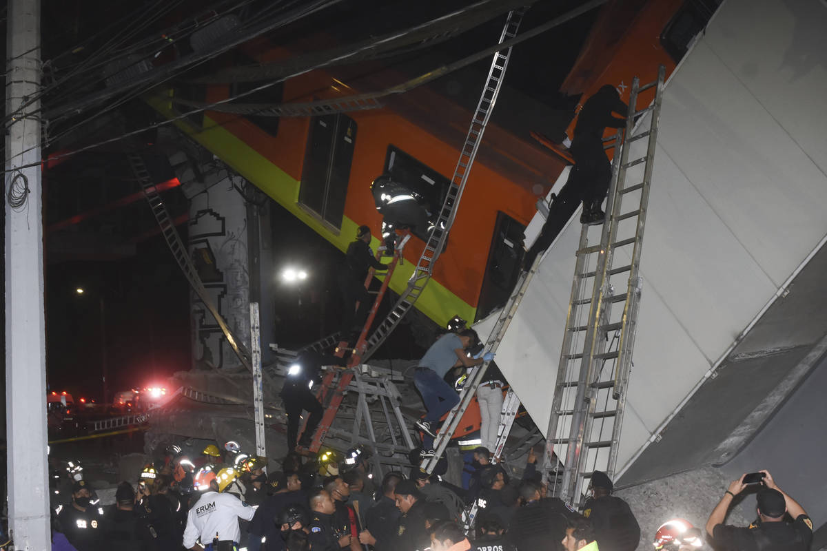 Mexico City fire fighters and rescue personnel work to recover victims from a subway accident a ...