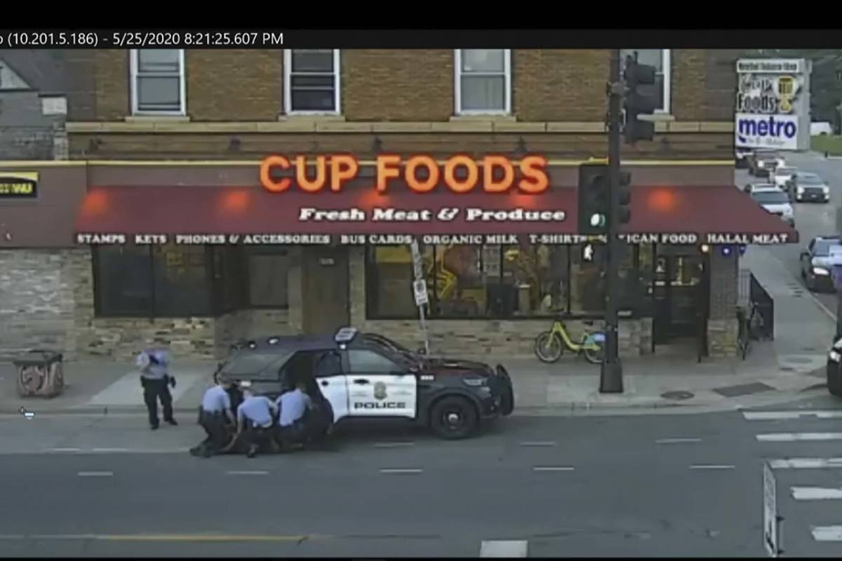 In this May 25, 2020 file image from surveillance video, Minneapolis police Officers from left, ...