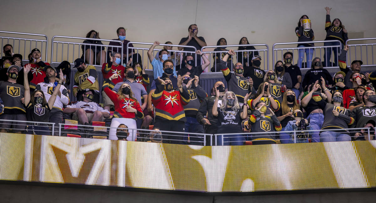 Golden Knights fans celebrate the first goal of the night versus the St. Louis Blues during the ...