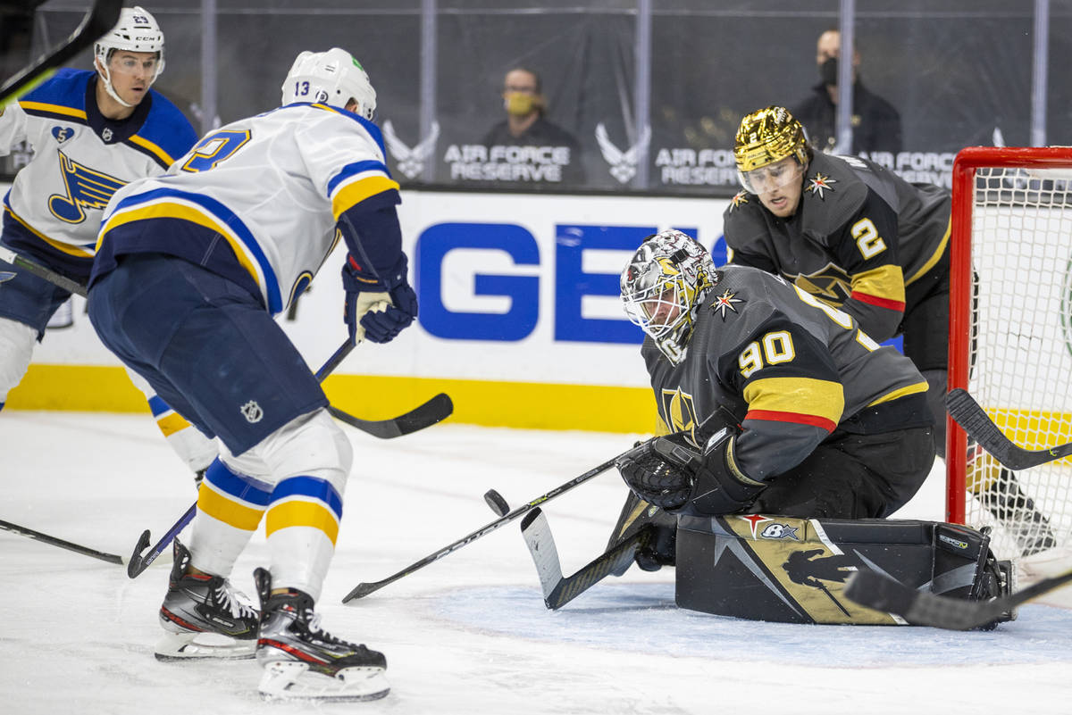 Golden Knights goaltender Robin Lehner (90) rejects a shot by St. Louis Blues left wing Kyle Cl ...