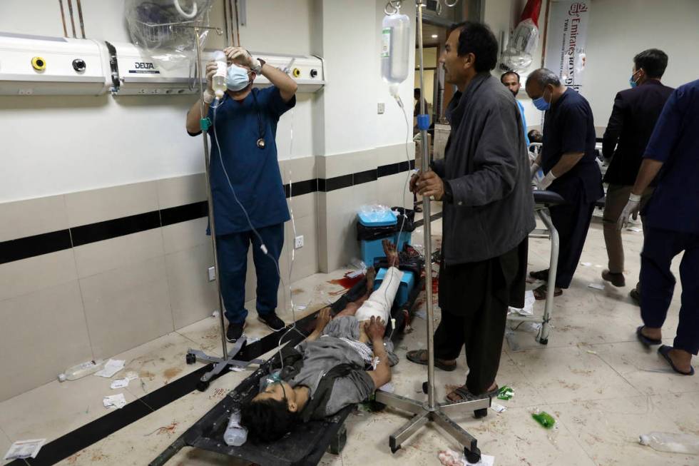 An Afghan school student treated at a hospital after a bomb explosion near a school west of Kab ...