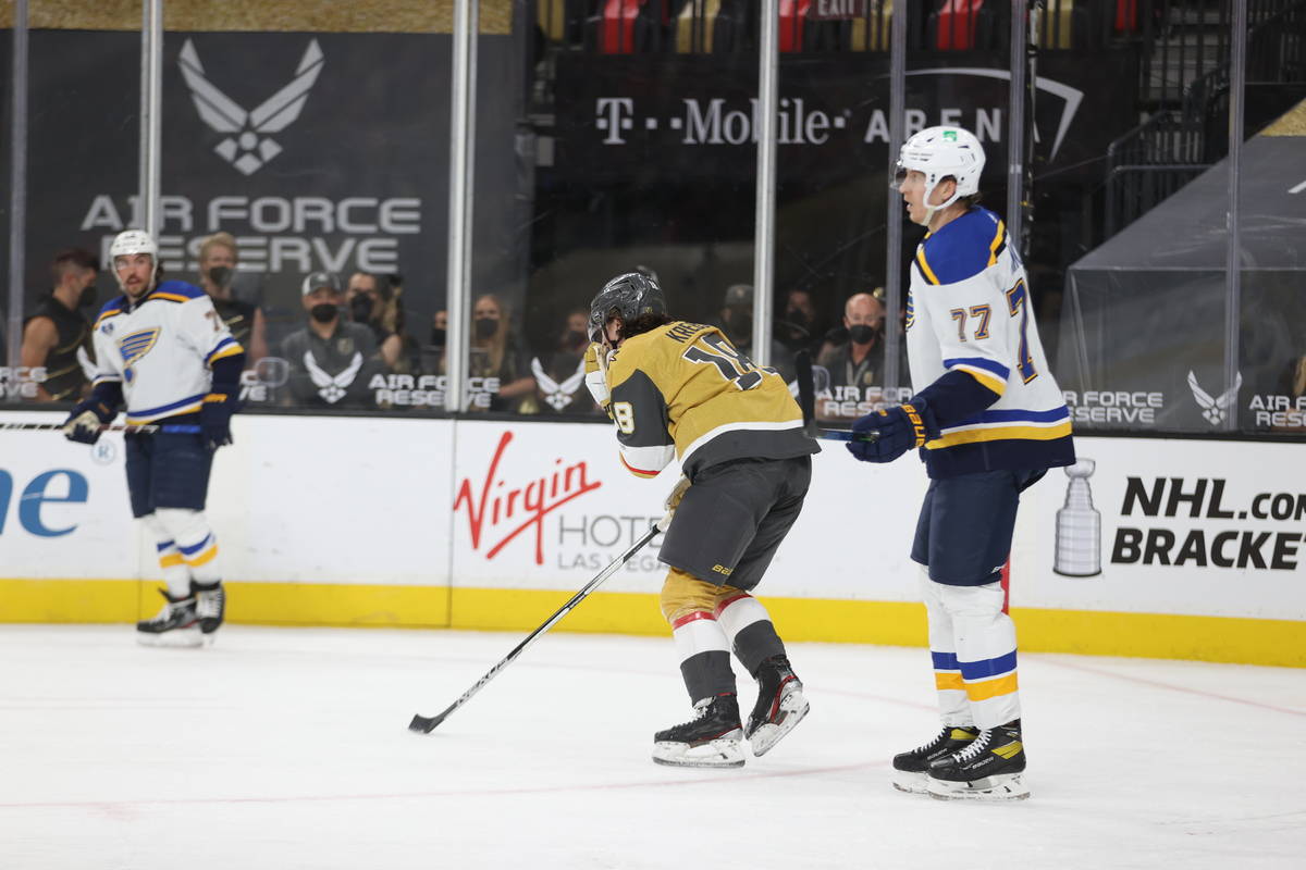 St. Louis Blues defenseman Niko Mikkola (77) looks on as Vegas Golden Knights left wing Peyton ...