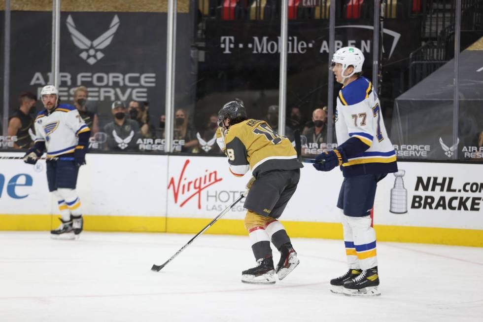 St. Louis Blues defenseman Niko Mikkola (77) looks on as Vegas Golden Knights left wing Peyton ...