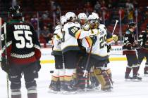 The Golden Knights celebrate with goaltender Marc-Andre Fleury (29) after an overtime win again ...