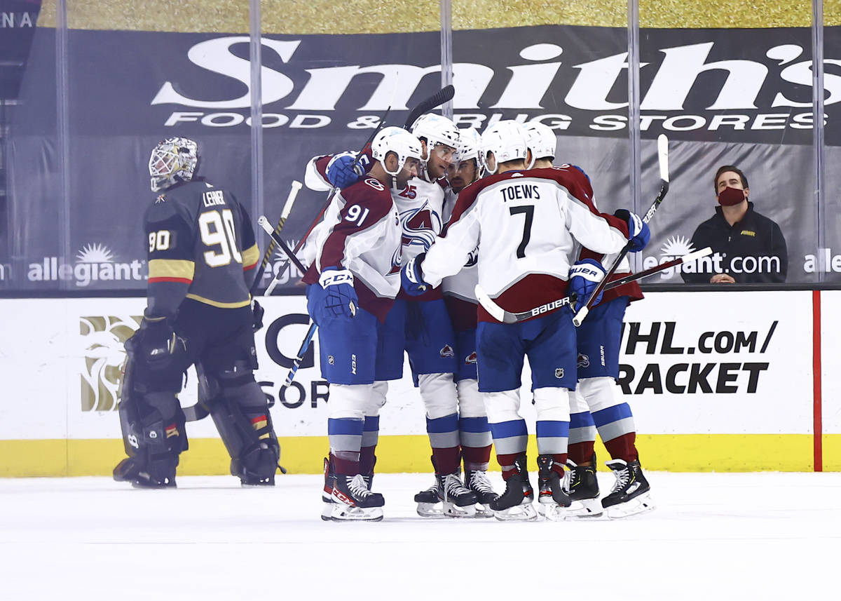 Colorado Avalanche players celebrate after a goal against the Golden Knights during the second ...