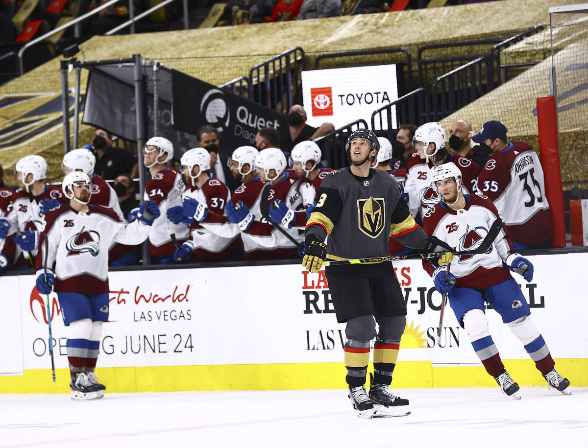 Golden Knights' Brayden McNabb (3) watches a replay after the team gave up a goal to Colorado A ...