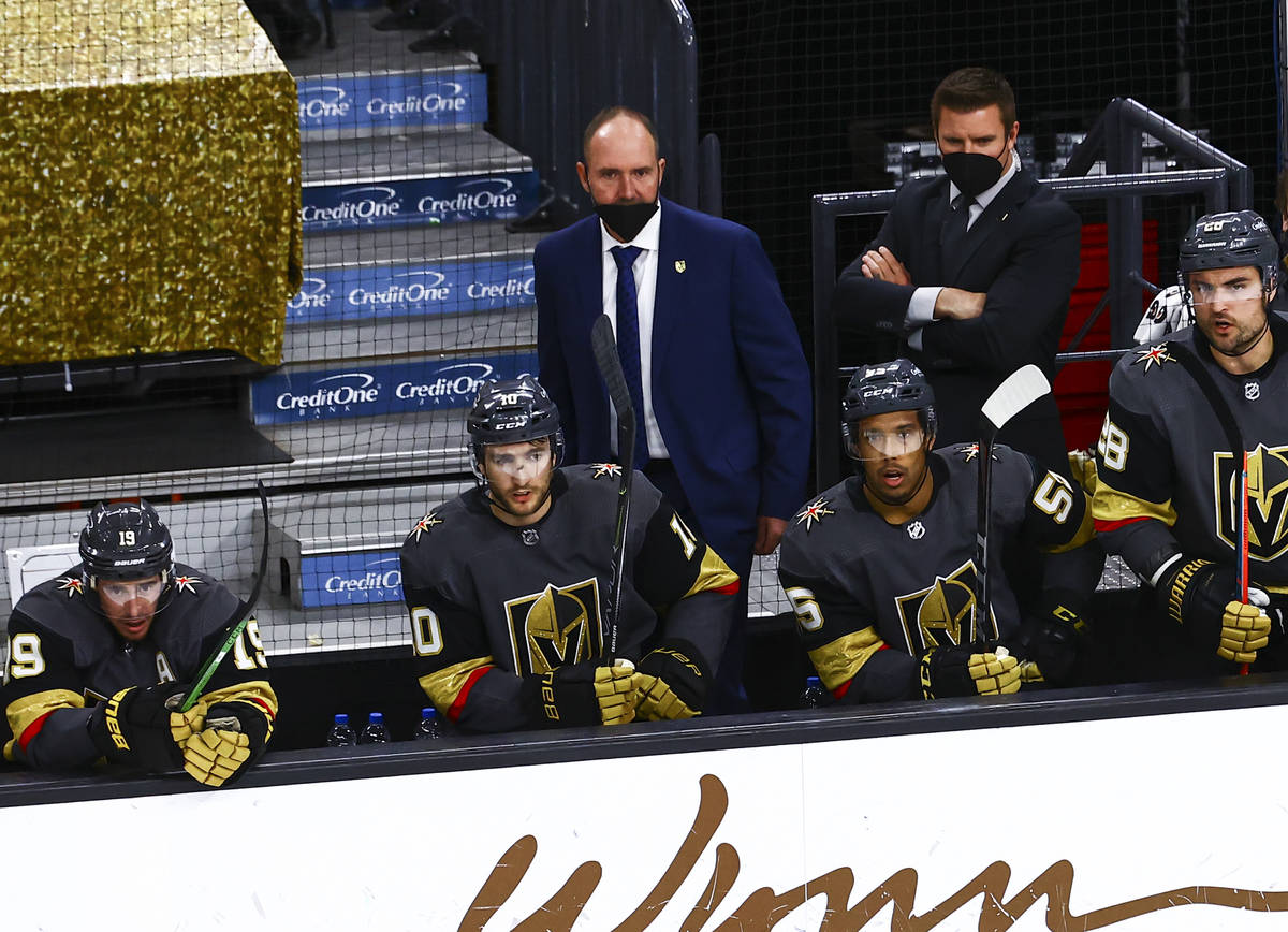 Golden Knights head coach Pete DeBoer looks on during the third period of an NHL hockey game ag ...