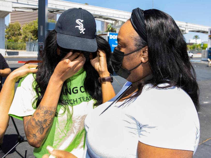 Yolanda Everett, left, comforted by her sister D'Errica Perryman, both Amari Nicholson's, a chi ...