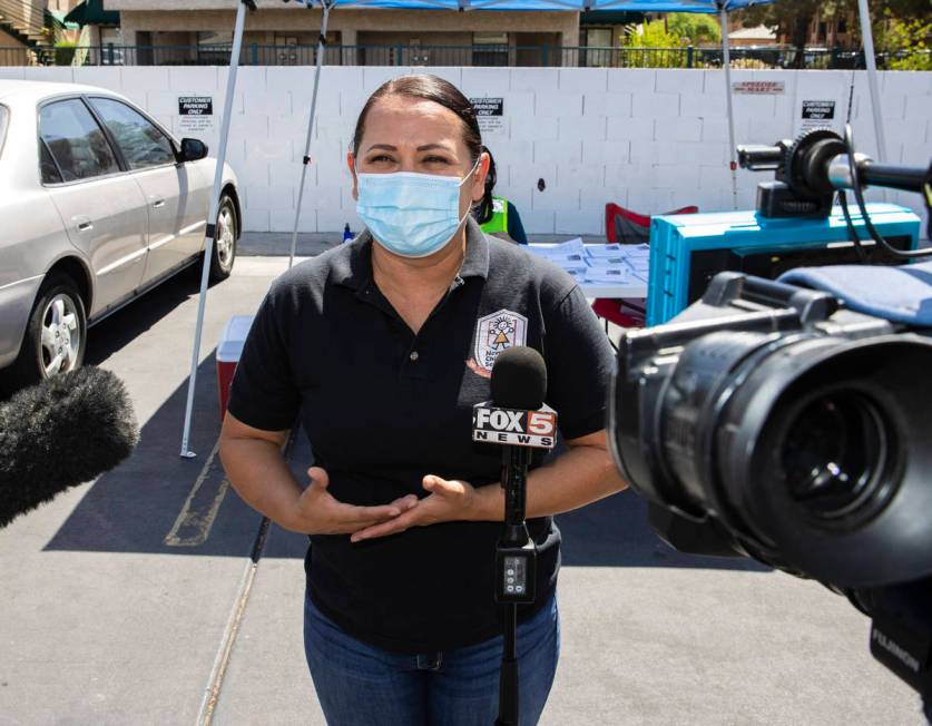 Margarita Edwards, executive director Nevada Child Seekers, addresses the media outside of Emer ...