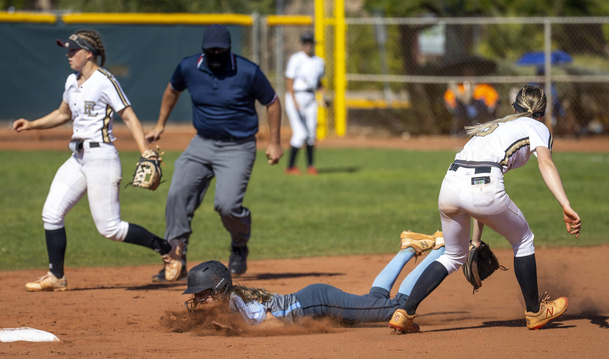 Centennial runner Madison Lucero (6) slides early to second base below a hit to the outfield as ...