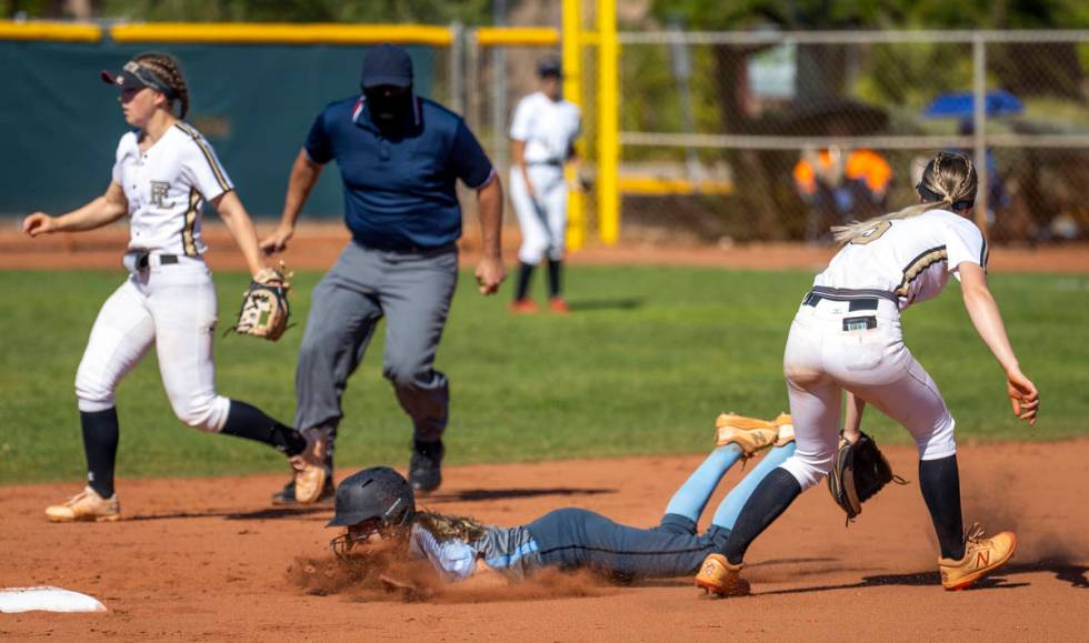 Centennial runner Madison Lucero (6) slides early to second base below a hit to the outfield as ...
