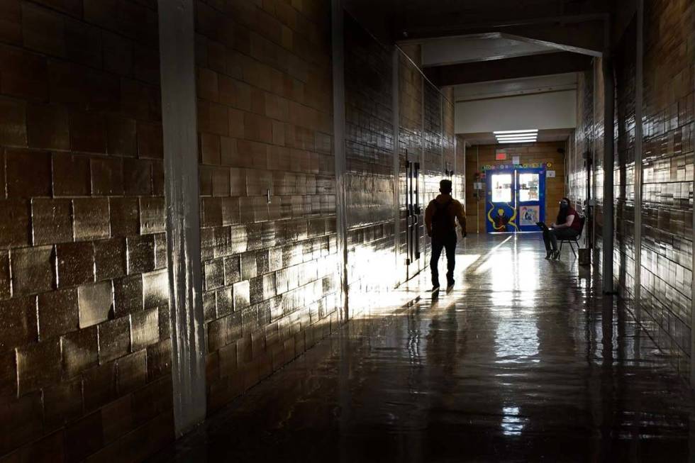 A student walks between classes at Wyandotte High School in Kansas City, Kan., on the first day ...