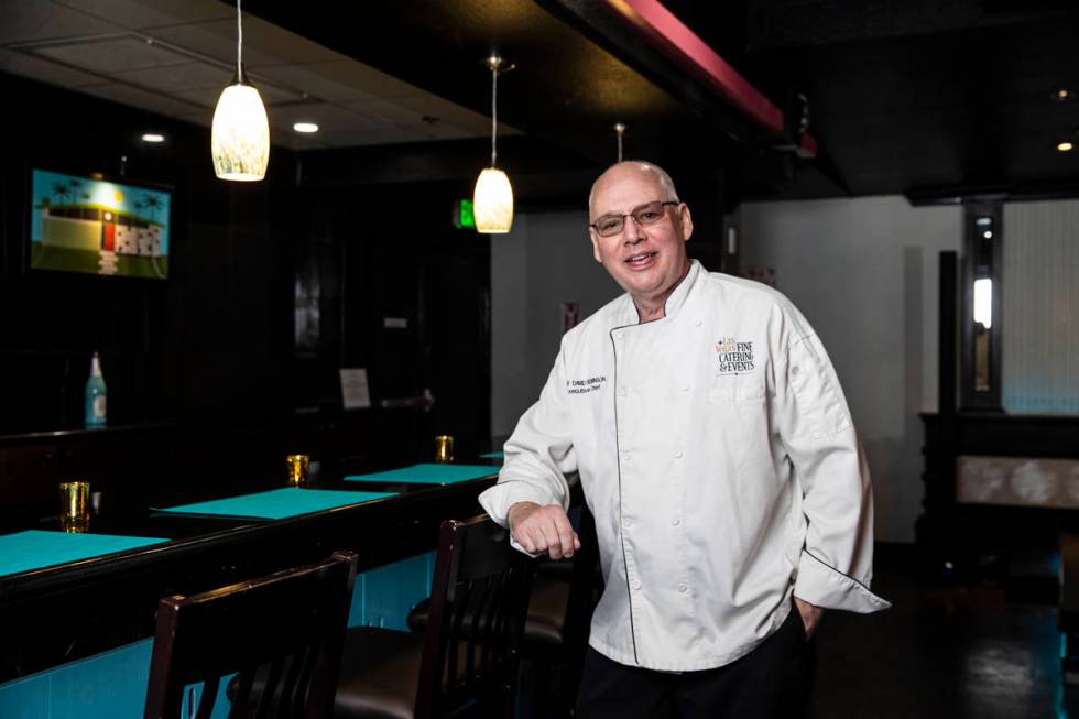 Chef David Robinson, owner of The Nevada Room, poses for a portrait at the venue at Commercial ...