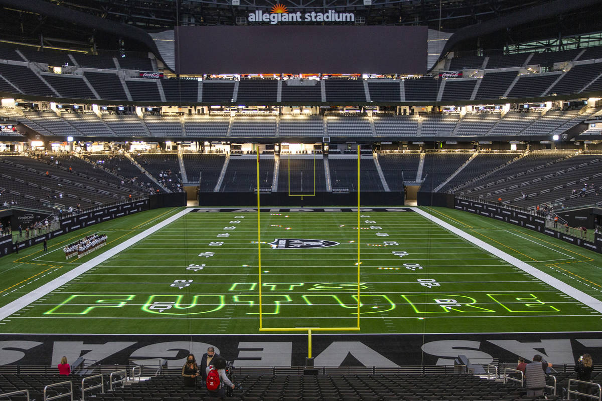 A short light show is projected onto the field during the 2021 Las Vegas Raiders NFL Draft Part ...