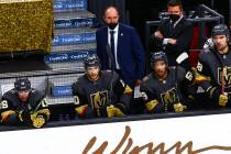 Golden Knights head coach Pete DeBoer looks on during the third period of an NHL hockey game ag ...