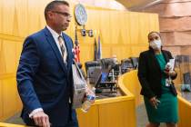 Metropolitan Police Department Detective Marc Colon leaves commission chamber after testifying ...