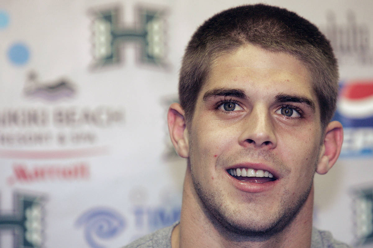 In this Dec. 5, 2007, file photo, then-Hawaii quarterback Colt Brennan speaks to the media afte ...
