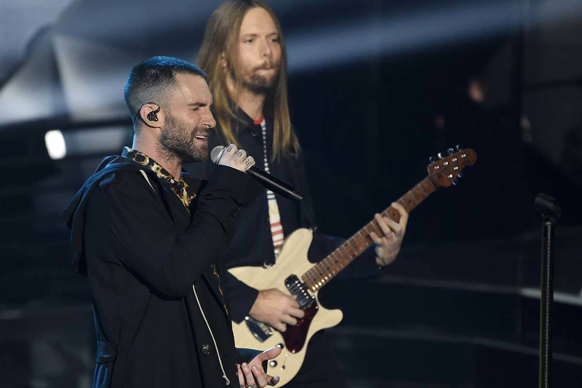 In this Sunday, March 11, 2018 file photo, Adam Levine, left, and James Valentine of Maroon 5 p ...