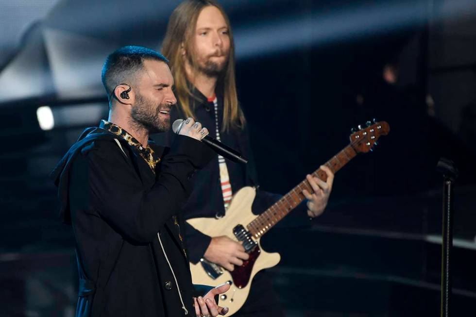 In this Sunday, March 11, 2018 file photo, Adam Levine, left, and James Valentine of Maroon 5 p ...