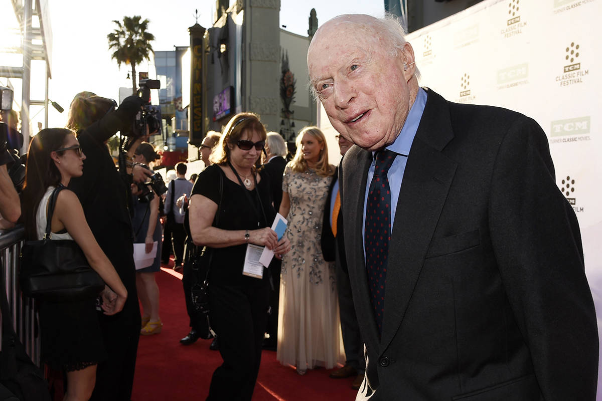 FILE - Norman Lloyd poses before a 50th anniversary screening of the film "The Sound of Mu ...
