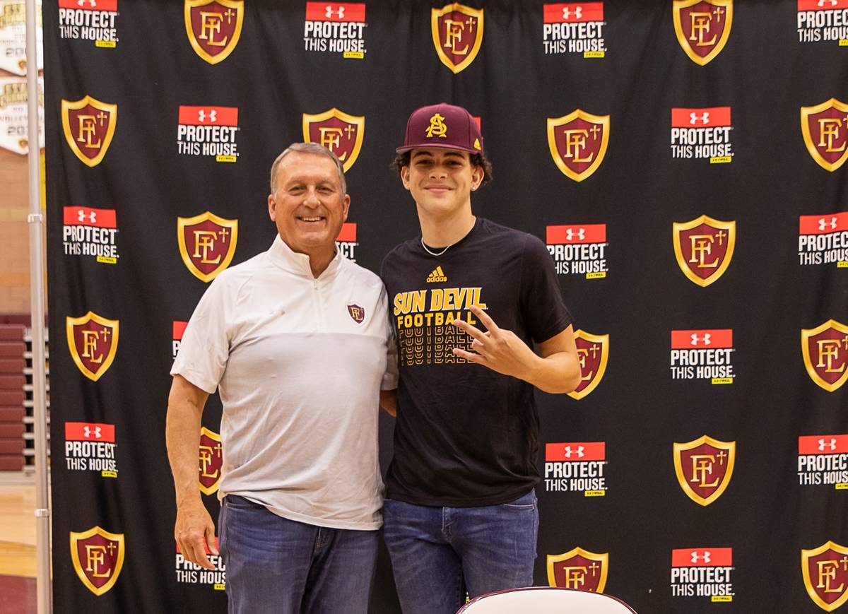 Adam Babb, a punter for the Faith Lutheran High School football team, is shown with Crusaders a ...