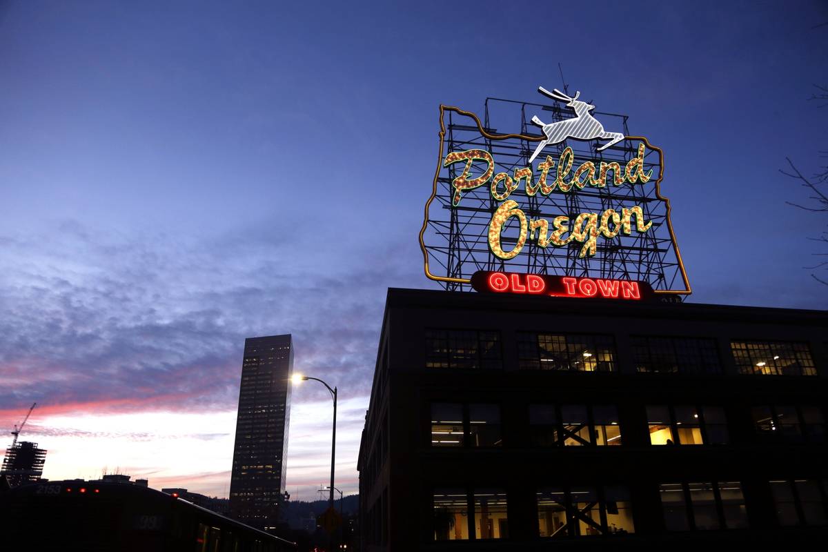 FILE - This Jan. 27, 2015, file photo, shows the "Portland, Oregon" sign in downtown Portland, ...