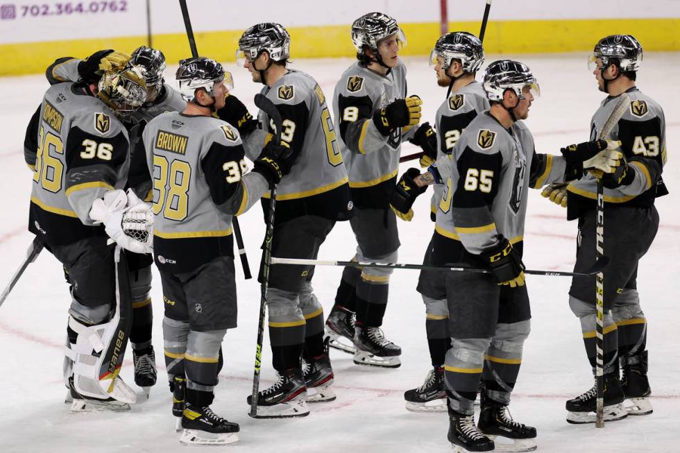 Henderson Silver Knights come together after a win against the Ontario Reign during an AHL hock ...