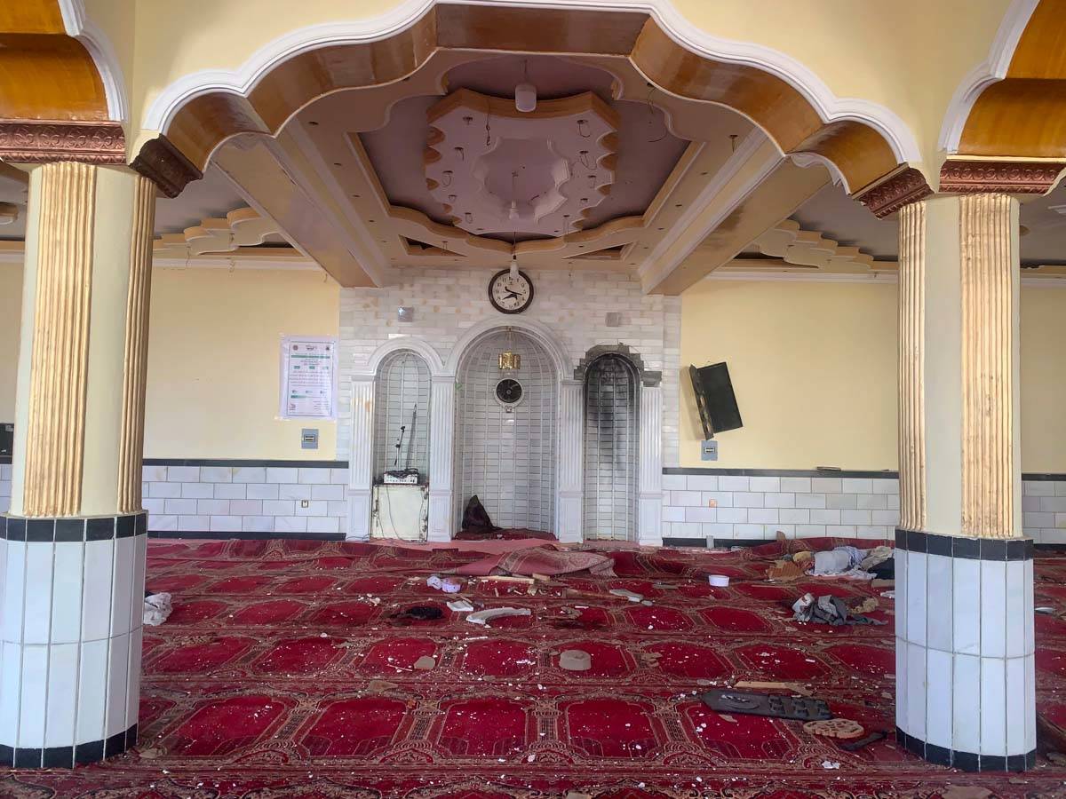 Debris covers the ground at a mosque after a bomb explosion in Shakar Dara district of Kabul, A ...