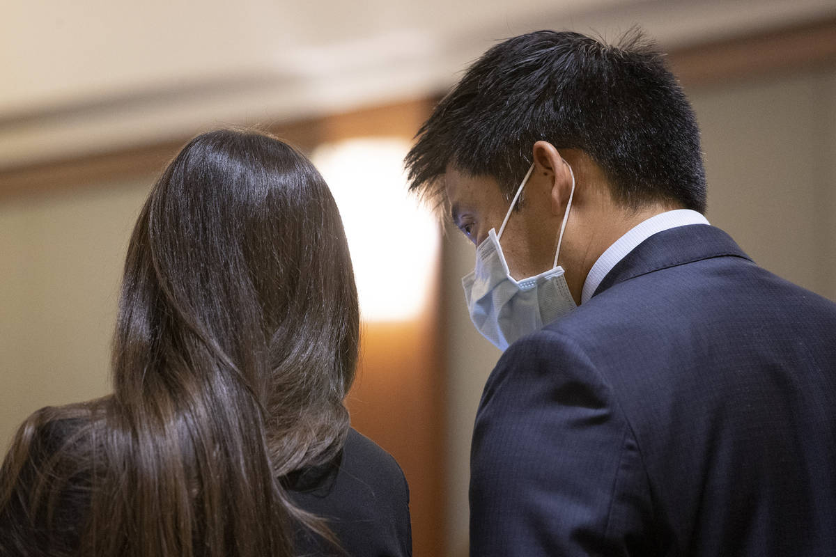 Prosecutor Alex Chen confers with prosecutor Brianna Stutz during a court hearing for Zane Floy ...