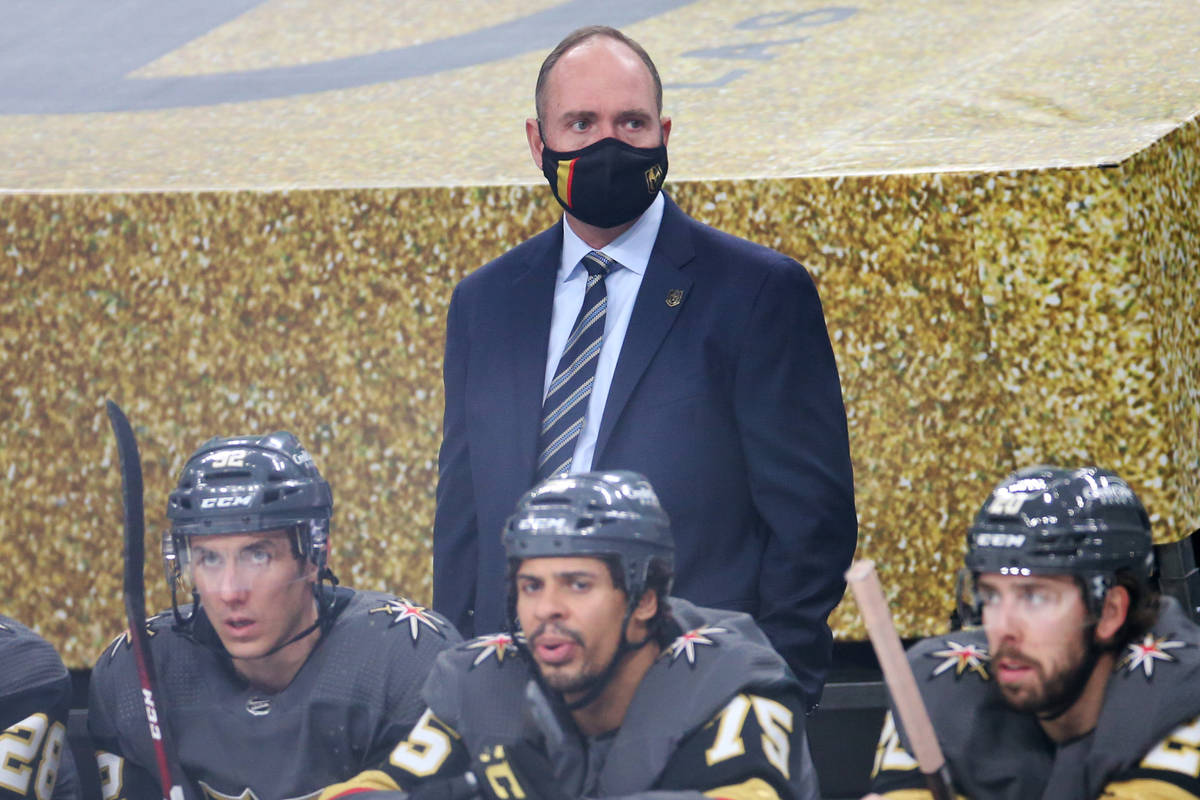 Vegas Golden Knights head coach Peter DeBoer, center, during the second period of an NHL hockey ...