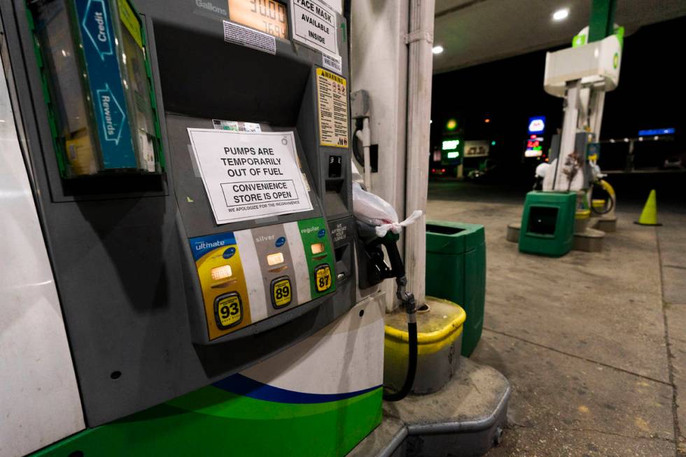 A pump at a gas station in Silver Spring, Md., is out of service, notifying customers they are ...