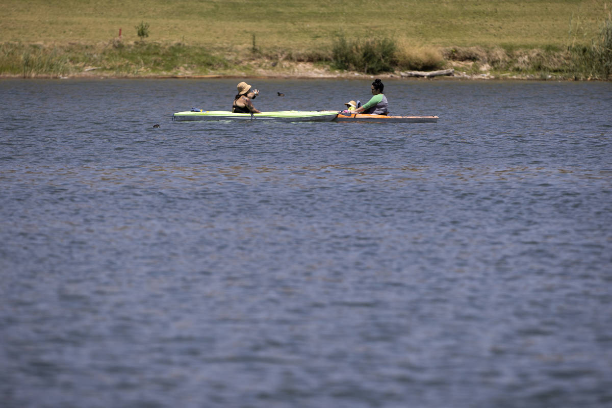 Kayakers take a break at Lake Las Vegas on Saturday, May 15, 2021 in Henderson. Lake Las Vegas ...