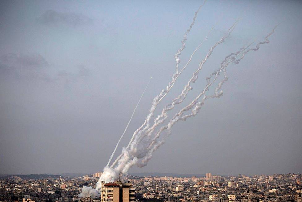 Rockets are launched from the Gaza Strip toward Israel, Monday, May. 10, 2021. (AP Photo/Khalil ...