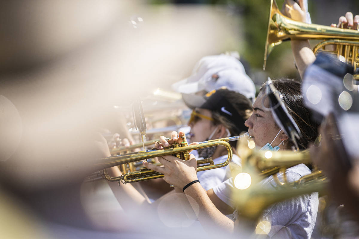 A line of trumpet players perform during the Las Vegas Days Parade on Saturday, May 15, 2021, i ...