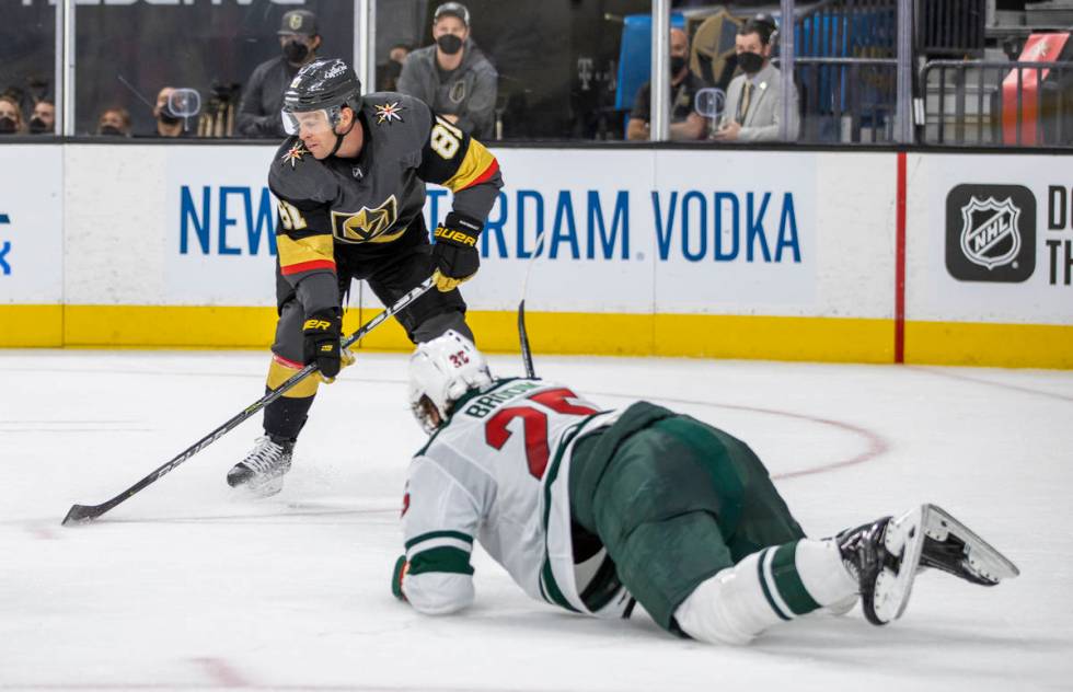 Golden Knights center Jonathan Marchessault (81) looks to shoot asMinnesota Wild defenseman Jon ...