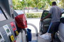 A customer leaves a Chevron station after it ran out of gasoline, Wednesday, May 12, 2021, in M ...