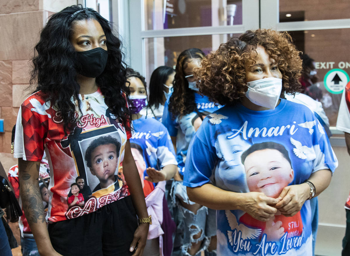 Yolanda Everett, left, and Zak Hayes-Ramos, both aunts of Amari Nicholson, stand outside the co ...