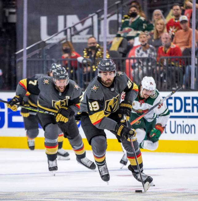 Golden Knights right wing Alex Tuch (89) breaks free up the ice for a shot attempt with teammat ...