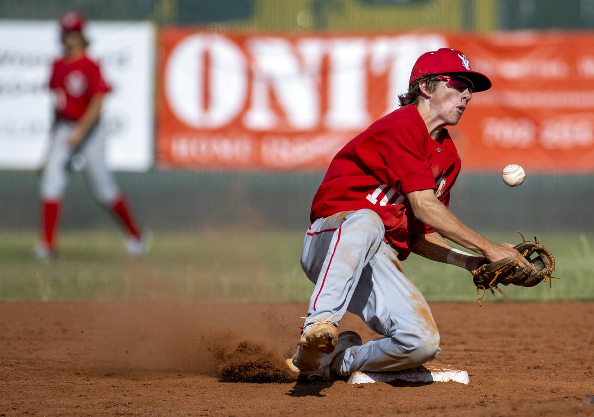 Arbor View infielder Park Roeder (10) bobbles a throw to second base versus Liberty during the ...