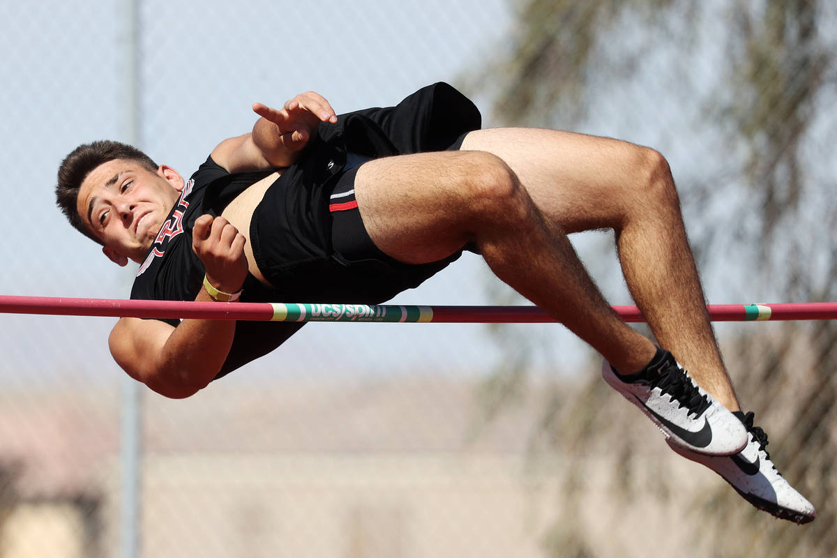 Desert Oasis Caleb Bowman clears the 5-foot-2 bar in the Boys his jump competition during the S ...