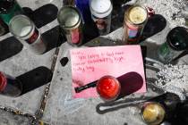A note for 2-year-old Amari Nicholson, who was killed earlier in the month, near a balloon rele ...