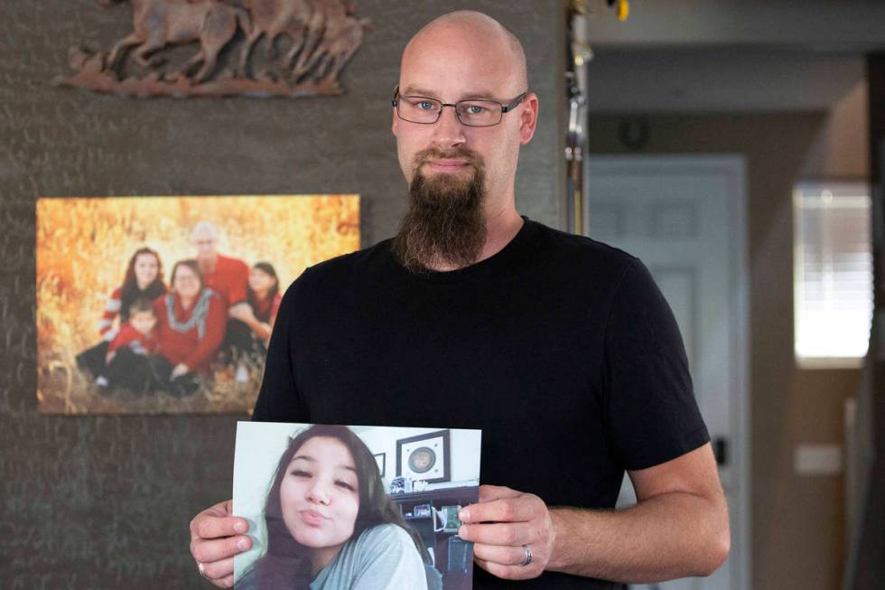 Ross Scheible holds a photo of his daughter, Aleah Scheible, at his home on Friday, May 21, 202 ...