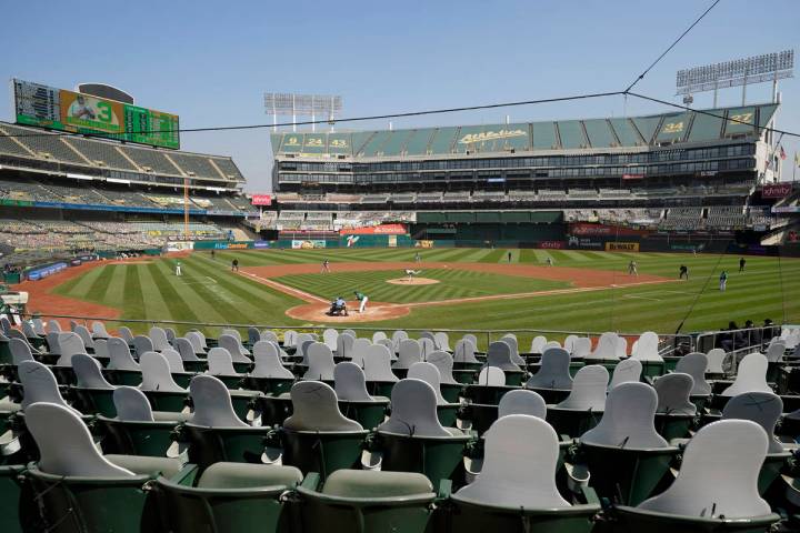 FILE - In this Sept. 30, 2020, file photo, cutouts are seated at Oakland Coliseum as Chicago Wh ...