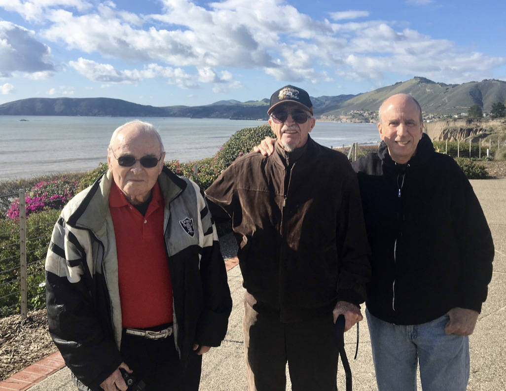 Retired Marine Peter "Chris" Christoff (center) poses with his longtime friends Bill Cotnam (le ...
