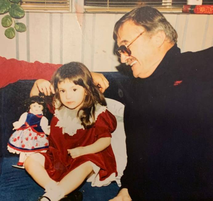Retired Marine Peter "Chris" Christoff is pictured in 1995 smiling at 2-year-old Sarah Ann Mill ...