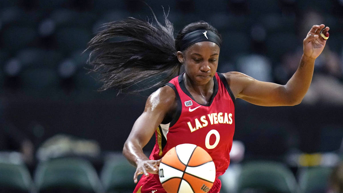 Las Vegas Aces' Jackie Young in action against the Seattle Storm during a WNBA basketball game ...